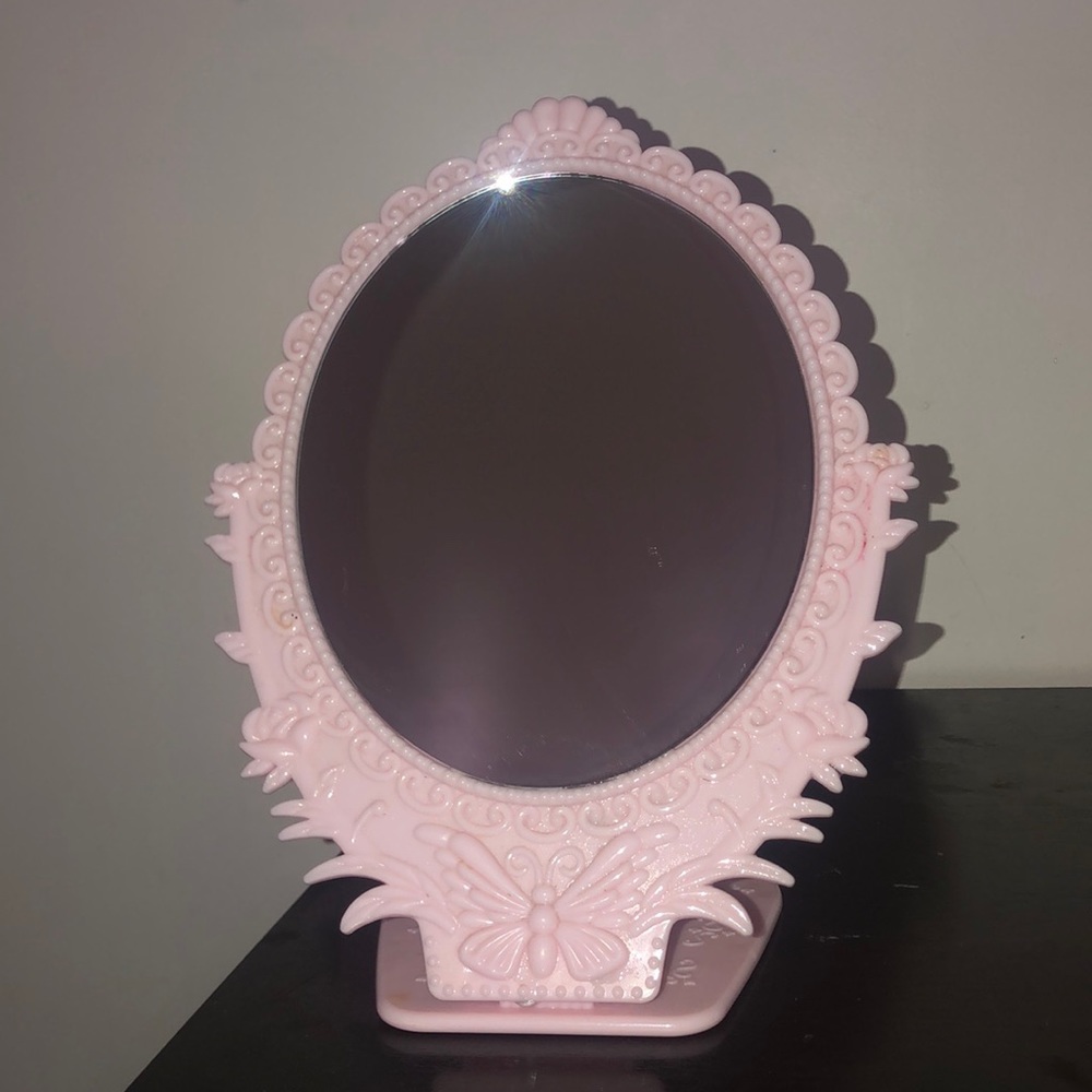 This light pink foldable mirror.